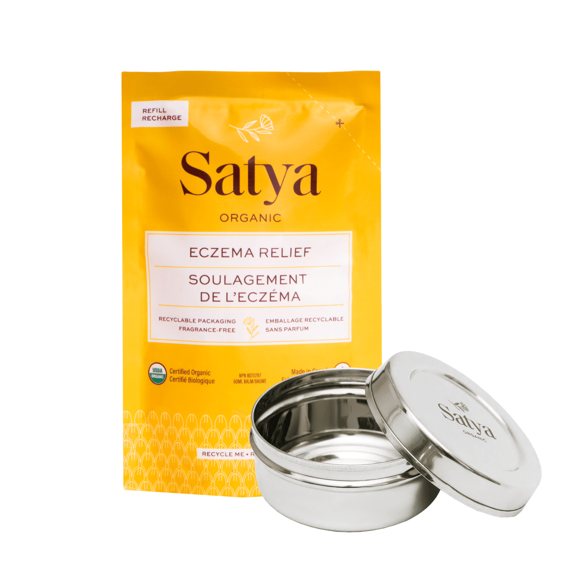 Satya Organic Eczema Relief refill pouch and a Satya Stainless Steel container