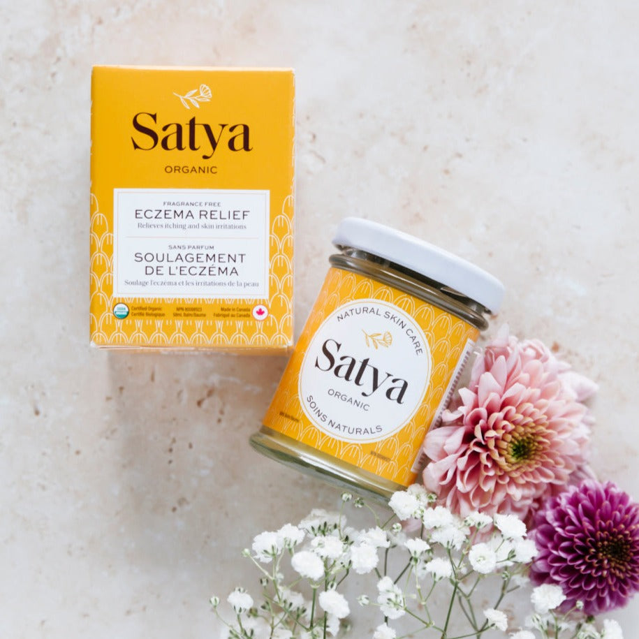 The Satya Eczema Relief jar, with it's packaging above it.