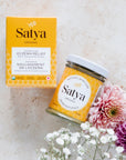 The Satya Eczema Relief jar, with it's packaging above it.